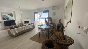 A television and/or entertainment centre at NV seafront villa Aegina 1