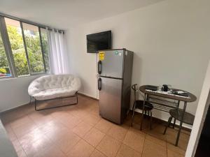 Η κουζίνα ή μικρή κουζίνα στο Suite con cocina pequeña y baño privado