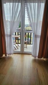 Fotografia z galérie ubytovania Apartament Bursztynowy v destinácii Rowy