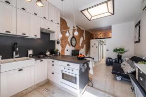 Η κουζίνα ή μικρή κουζίνα στο tHE Brick Nest - Navigli View