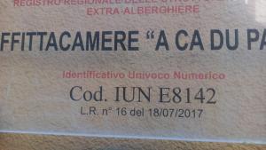 a label on the side of a cardboard box at A Cà du Paise in Carloforte +5 photos