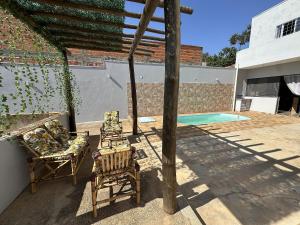 Πισίνα στο ή κοντά στο Suites dos Laranjais