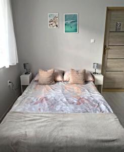 Łóżko lub łóżka w pokoju w obiekcie U Szwagra
