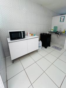 Kuchyň nebo kuchyňský kout v ubytování Casa Temporada Suítes