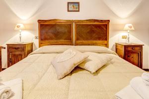 Postel nebo postele na pokoji v ubytování Agriturismo I Portici