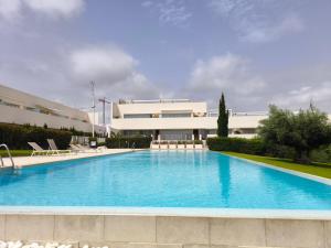 Kolam renang di atau dekat dengan Elegant ground floor bungalow in La Coronelita, Los Balcones, with communal pool