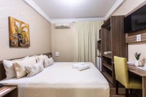 Postel nebo postele na pokoji v ubytování Amuarama Hotel