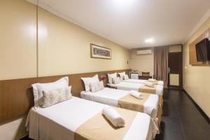 Postel nebo postele na pokoji v ubytování Amuarama Hotel
