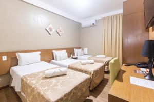 Postel nebo postele na pokoji v ubytování Amuarama Hotel