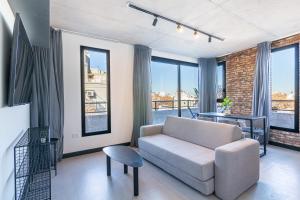 Televisyen dan/atau pusat hiburan di Soho Village Palermo Apartments - By Magno