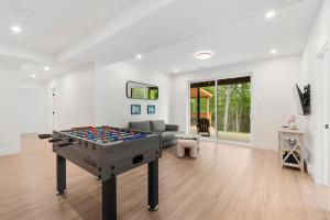 Herní místnost v ubytování Chalet Soléa by Rendez-Vous Mont- Tremblant