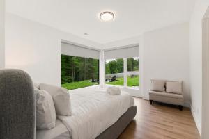 Posezení v ubytování Chalet Soléa by Rendez-Vous Mont- Tremblant