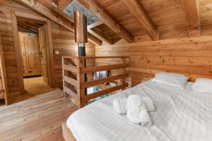 Rúm í herbergi á Chalet à Arolla 8 personnes - vue, nature & parking privé