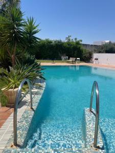 Bazén v ubytování Hammamet Serenity nebo v jeho okolí