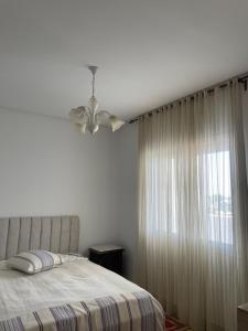 Postel nebo postele na pokoji v ubytování Hammamet Serenity