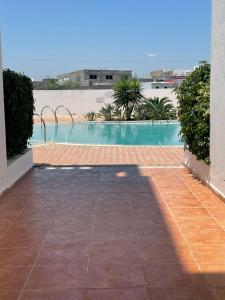 Bazén v ubytování Hammamet Serenity nebo v jeho okolí