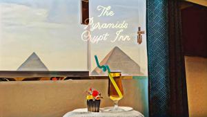 Certifikát, hodnocení, plakát nebo jiný dokument vystavený v ubytování The Pyramids Crypt Inn