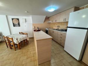 Η κουζίνα ή μικρή κουζίνα στο Despina's Home +6 φωτογραφίες