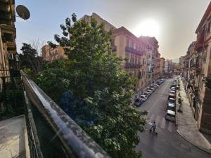 a view of a city street with cars parked at Sofia's Central Apartment Palermo in Palermo