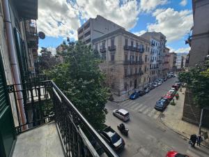 a view of a city street with cars parked at Sofia's Central Apartment Palermo in Palermo