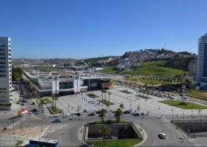 a view of a city with a parking lot at Hilton City Center Apartment in Tangier