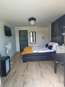 Postel nebo postele na pokoji v ubytování B&B Speulderveld