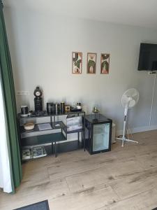 TV a/nebo společenská místnost v ubytování B&B Speulderveld