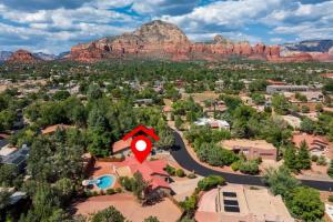 an aerial view of a resort with a mountain in the background at Sedona Southwest Home with Views Pool and Spa for Family in Sedona