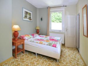 Katil atau katil-katil dalam bilik di Spacious group house in the Harz region