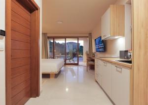 Nhà bếp/bếp nhỏ tại Villa Lojena, luxury studio with Jacuzzi id 112
