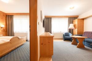 Posteľ alebo postele v izbe v ubytovaní Aparthaus Camping Stubai