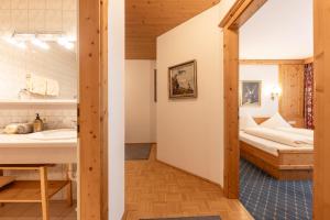 Posteľ alebo postele v izbe v ubytovaní Aparthaus Camping Stubai
