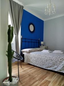 En eller flere senge i et værelse på Note di Luna 1