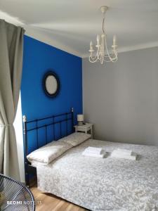 En eller flere senge i et værelse på Note di Luna 1