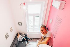 Televízia a/alebo spoločenská miestnosť v ubytovaní happy home POP