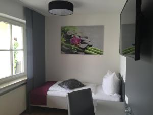 Postel nebo postele na pokoji v ubytování Torstuben
