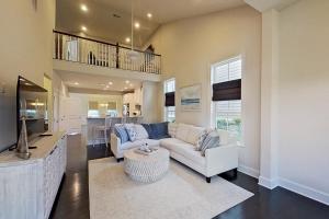 a living room with a couch and a table at Bayside Resort --- 30141 Candleberry Dr in Selbyville