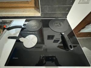 a view from above of a counter top with a camera at La casina di Stellatattoo in Crotone