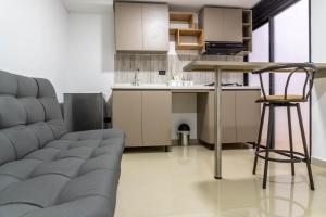 Kuchyň nebo kuchyňský kout v ubytování ApartaHotel Estadio
