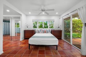 Ένα ή περισσότερα κρεβάτια σε δωμάτιο στο Alaeloa 35 +59 φωτογραφίες