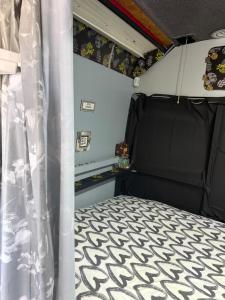 a bed in the back of a camper van at Rinconcito Dreams in Tahiche +32 photos