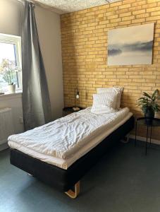 Ένα ή περισσότερα κρεβάτια σε δωμάτιο στο MOVE Eco Health Hotel