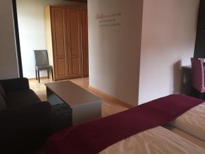Postel nebo postele na pokoji v ubytování Torstuben