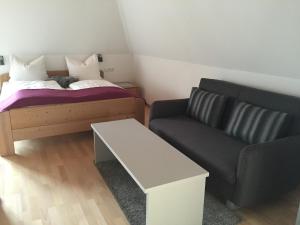 Postel nebo postele na pokoji v ubytování Torstuben