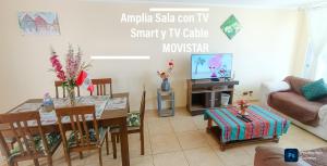 TV in/ali zabaviščno središče v nastanitvi FRENTE AL MAR en SAN MIGUEL Apartamento LIMA CHECK IN + 37 fotografij