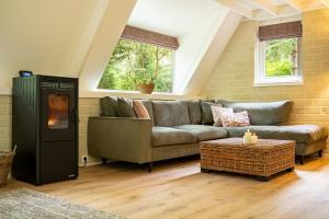 Posezení v ubytování Boshuisje Rekem - Nilsson