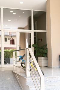 a person doing a trick on a skateboard on a rail at Liora Seaview Apartments in Shëngjin