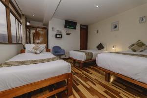 Postel nebo postele na pokoji v ubytování Cozy Room Cusco