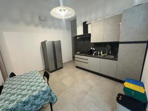 Dapur atau dapur kecil di affitta camere Es Vedrà