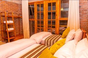 Vuode tai vuoteita majoituspaikassa Daima Escape